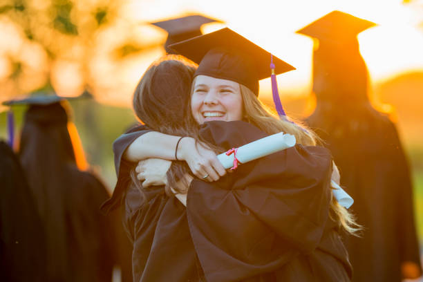 Image of students celebrating graduation