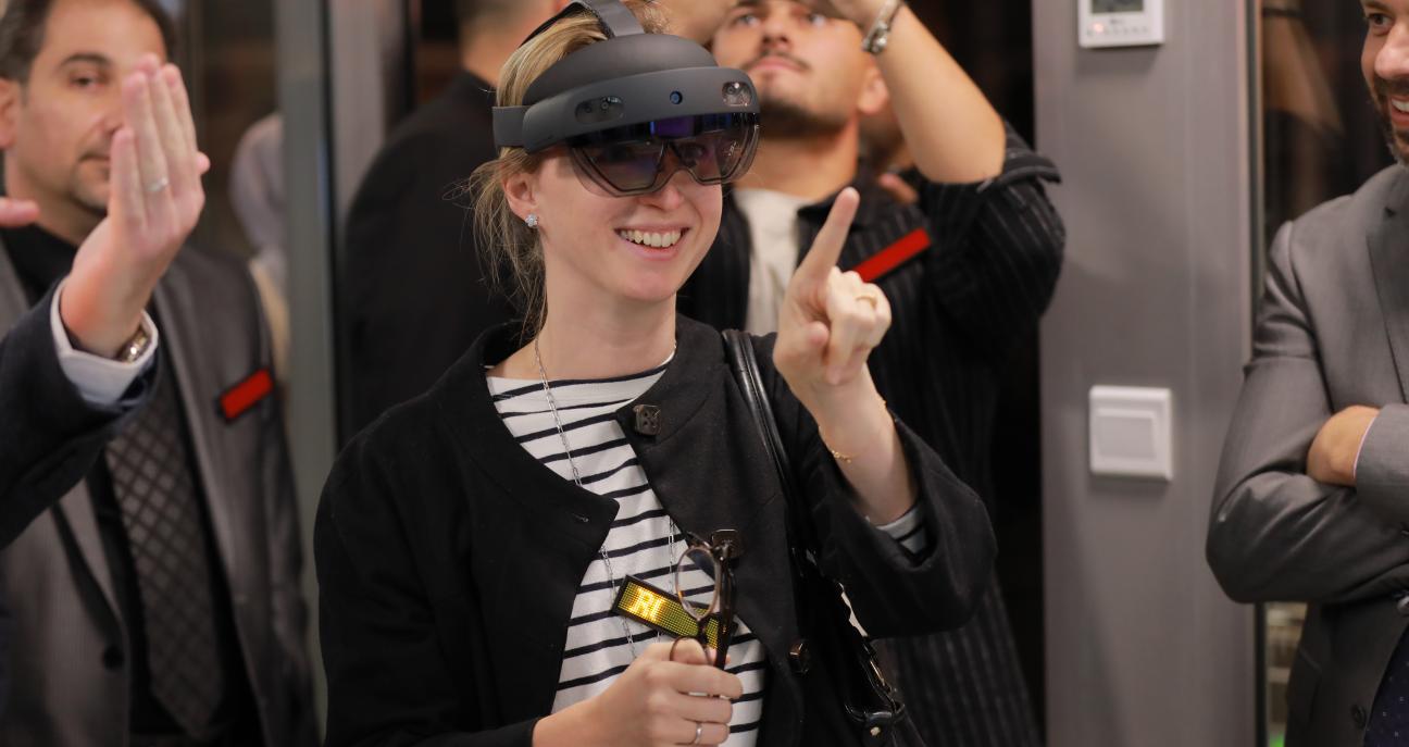 Image of an innovation hub with students and technology