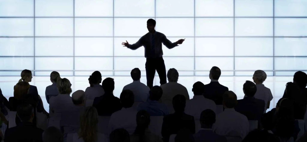 Students presenting academic project or coding on computers